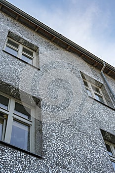 Tenant house in ÅÃ³dÅº, Poland covered with mirror shards